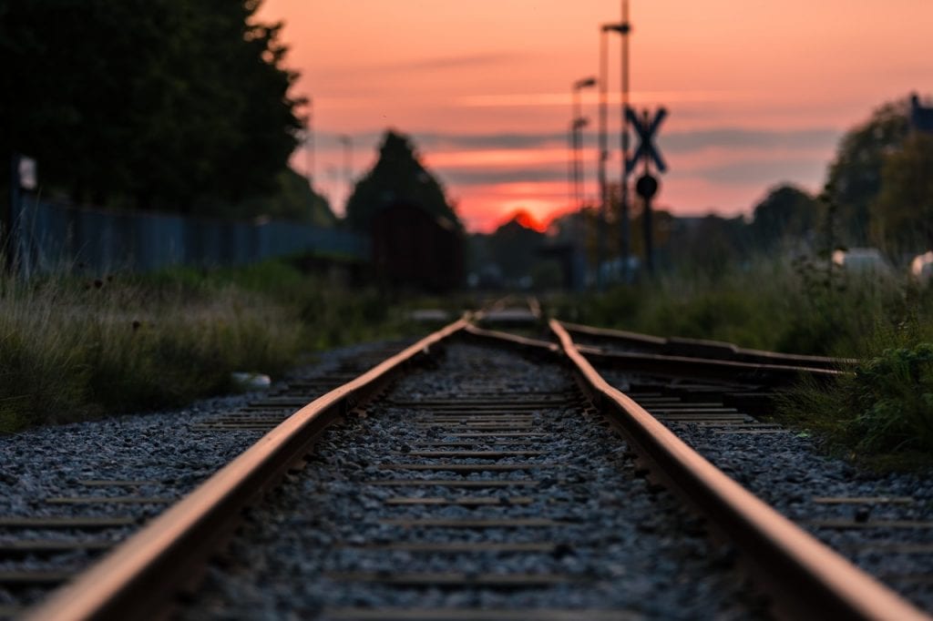 shallow-focus-photography-of-railway-during-sunset-892541 Change Management Consultants