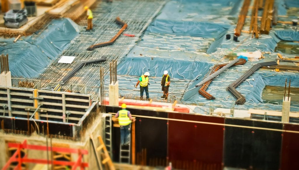man-in-yellow-safety-vest-climbing-on-ladder-159358 Project Management Consultants